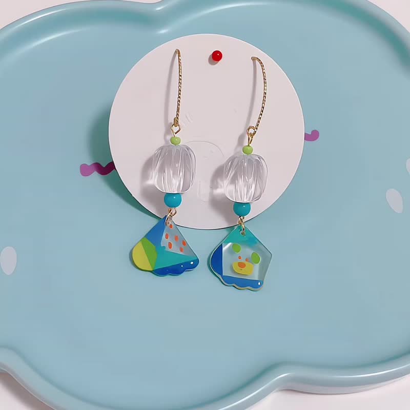 A pair of baby bear earrings immersed in a paint tray - Earrings & Clip-ons - Resin Blue