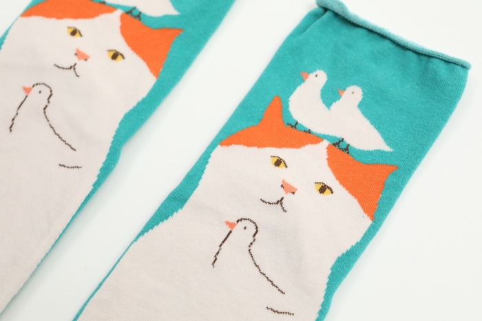 White and turquoise little cat socks with birdies