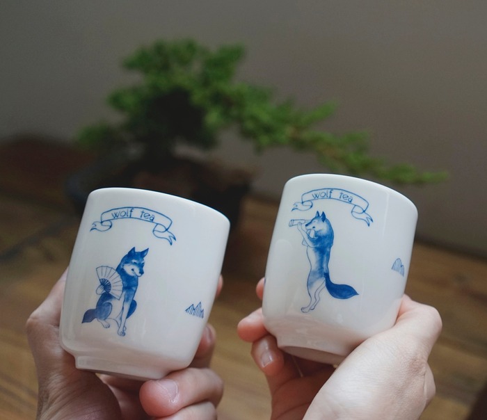 White ceramic tea cups with blue wolf painting gifts