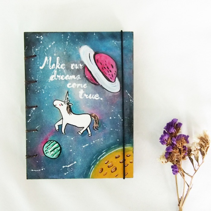 Illustration cosmic unicorn notebook cover