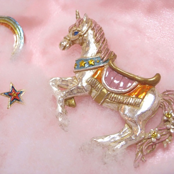 Golden finish vintage style unicorn brooch