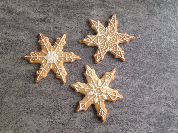Holiday dessert: snowflake icing cookies and milk
