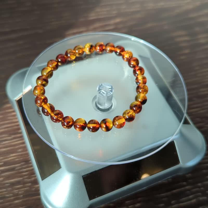 Natural amber flower bracelet [7mm] - สร้อยข้อมือ - คริสตัล สีเหลือง