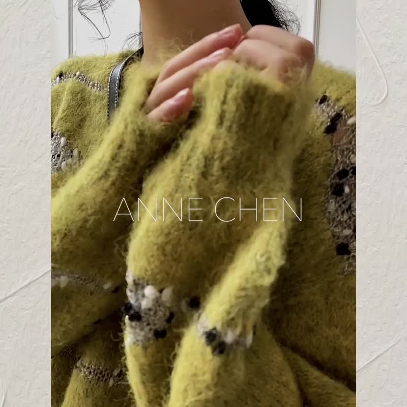 アニー・チャンのファッションシンプルな色合わせのゆったりとしたセットトップ100枚編み長袖セーター